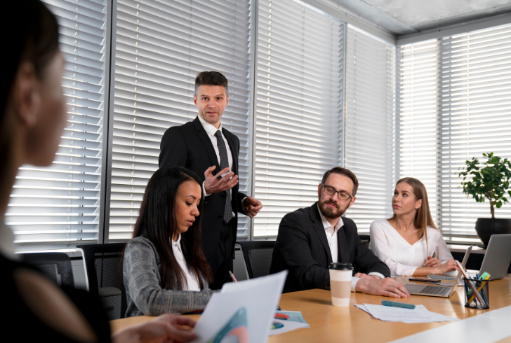 Leader guiding team with shared values